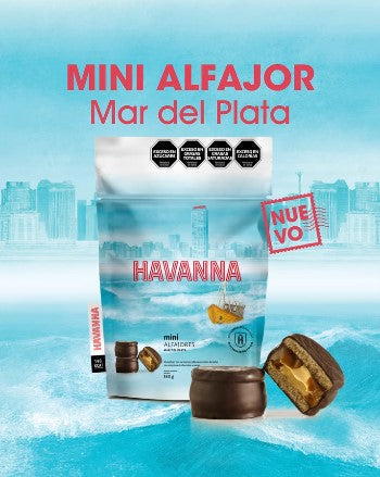 A bag of Havanna Mar del Plata Edition Mini Alfajores, featuring 14 bite-sized treats coated in 70% cocoa dark chocolate, filled with creamy dulce de leche, and sprinkled with sea salt. The premium packaging highlights this exclusive, gourmet release, celebrating Havanna’s tradition in a compact, shareable format.