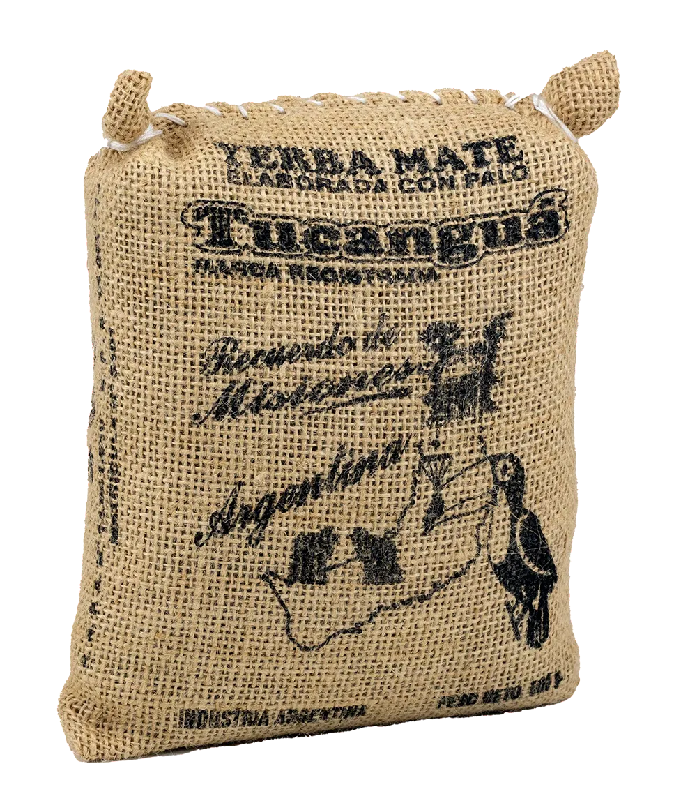 Rustic burlap bag of Tucanguá Yerba Mate, 1 kg, traditional flavor.